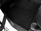  Driver's floor mat and pedals. Mid-seat level from outside looking in photo